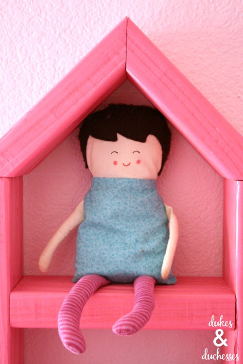 dollhouse shelf on wall