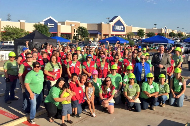 women build with lowes and habitat for humanity