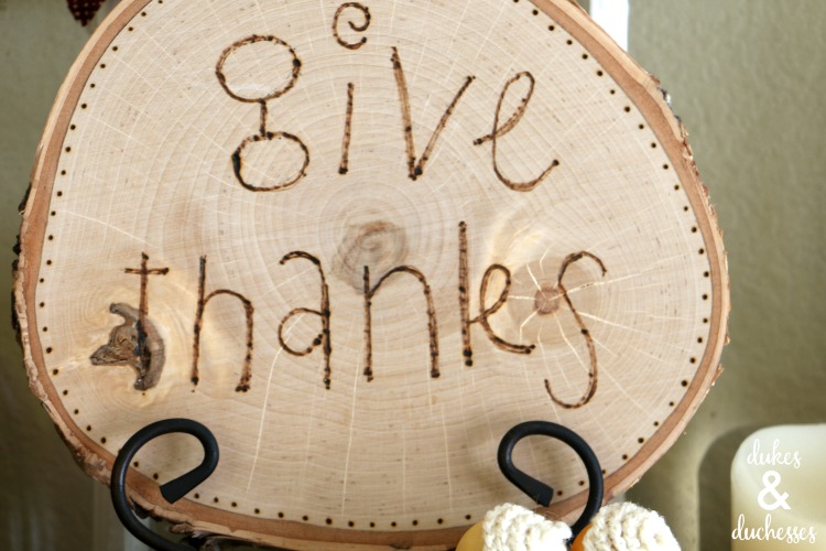 wood burned give thanks sign on thanksgiving mantel