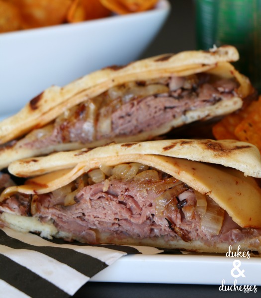 panini sandwich with roast beef and caramelized onions