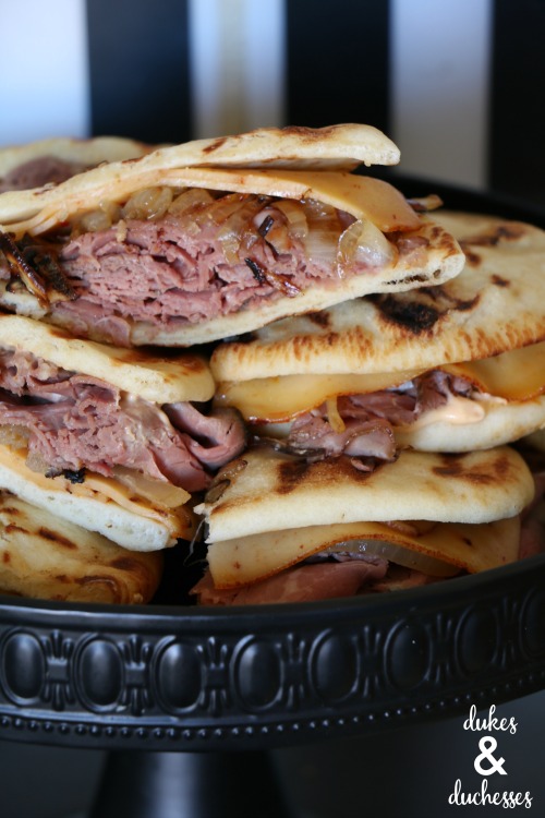panini sandwich with roast beef and caramelized onions