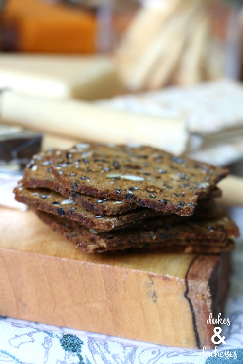 specialty crackers on a pantry cheese board