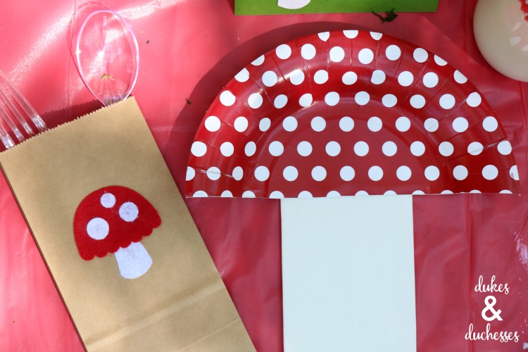 toadstool place settings made with paper plates and napkins