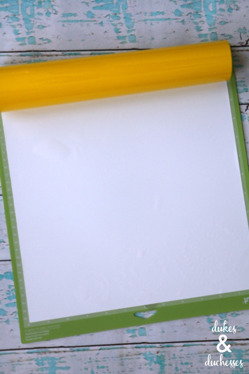 how to place iron on vinyl on mat